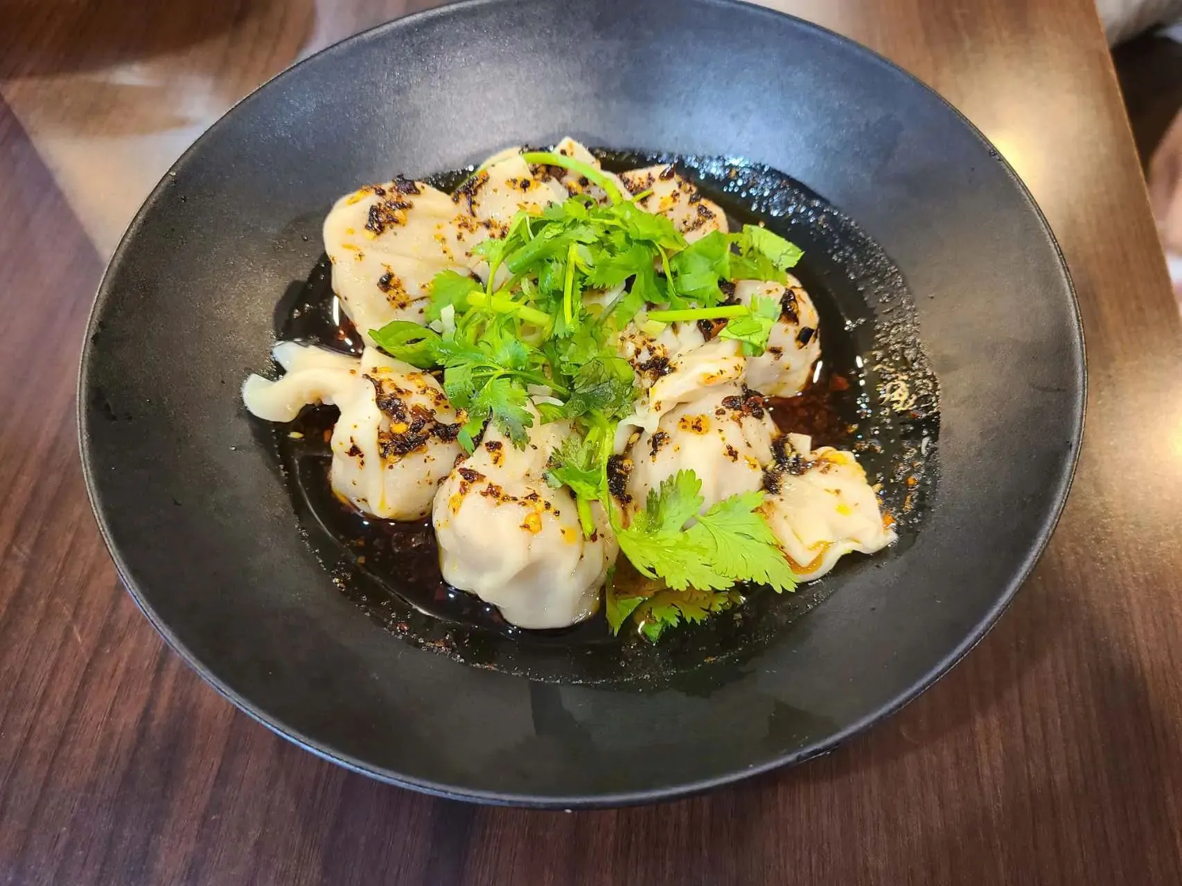 Wontons in spicy chili oil with coriander at 1st Dumpling N Noodle, a Chinese Restaurant in CA